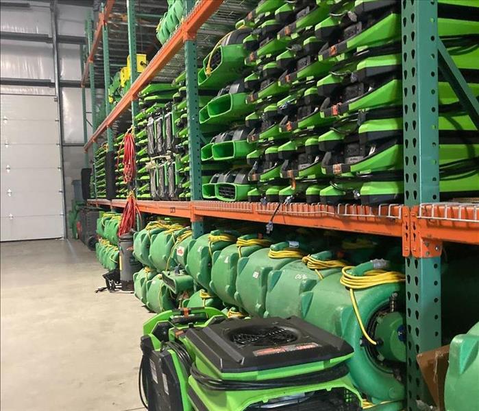 Warehouse wall of green SERVPRO machine equipment